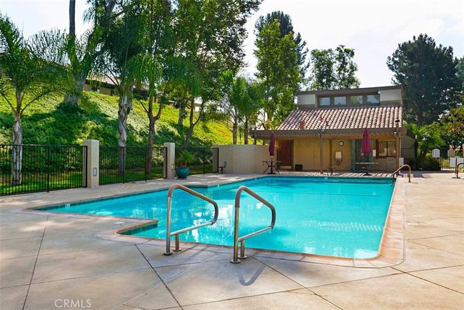 Here is a view of one of the community pool areas | Image 32