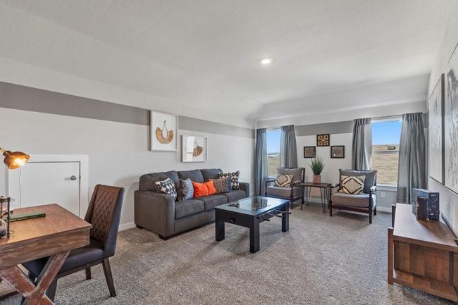 Carpeted living room/Game Room featuring plenty of natural light. Virtually staged. | Image 17