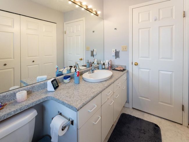 Bathroom with toilet and vanity | Image 24