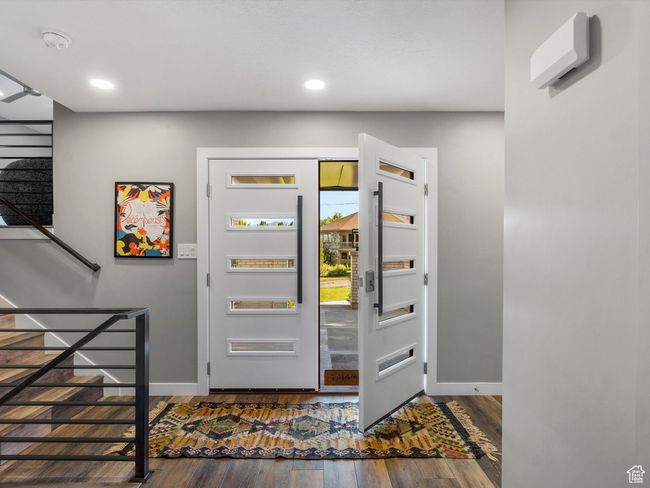 Entrance foyer featuring dark wood-style flooring and recessed lighting | Image 4
