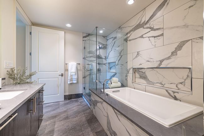 Luxurious walk-in shower and roomy tub for ultimate relaxation. | Image 14