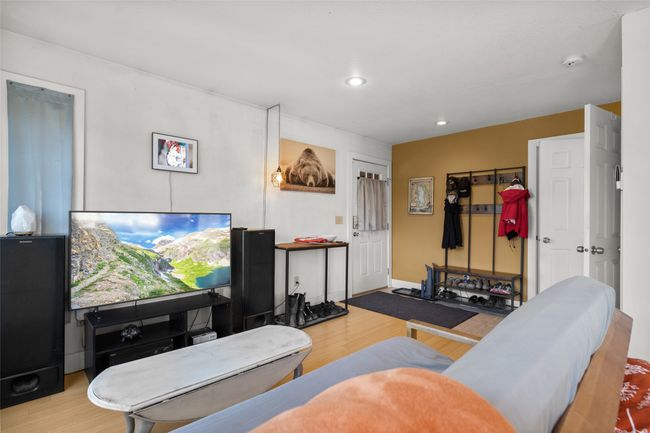 Living area featuring wood finished floors and recessed lighting | Image 35