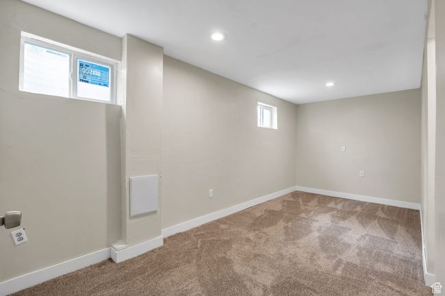 Basement with baseboards, carpet, and recessed lighting | Image 25
