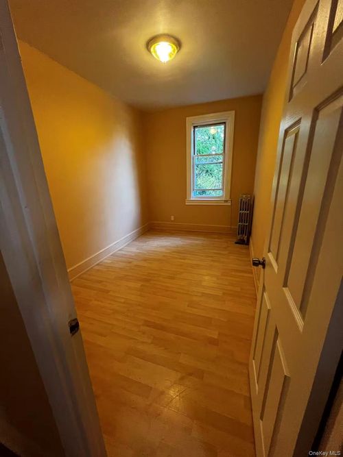 56 Metropolitan Ave, Ridgewood, NY, 11385-1958 | Card Image