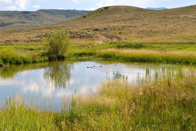 Property view of water with a mountain view | Image 11