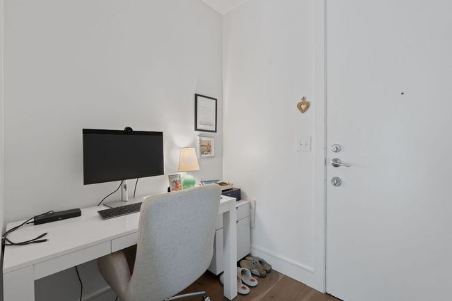 Home office featuring wood finished floors and baseboards | Image 19