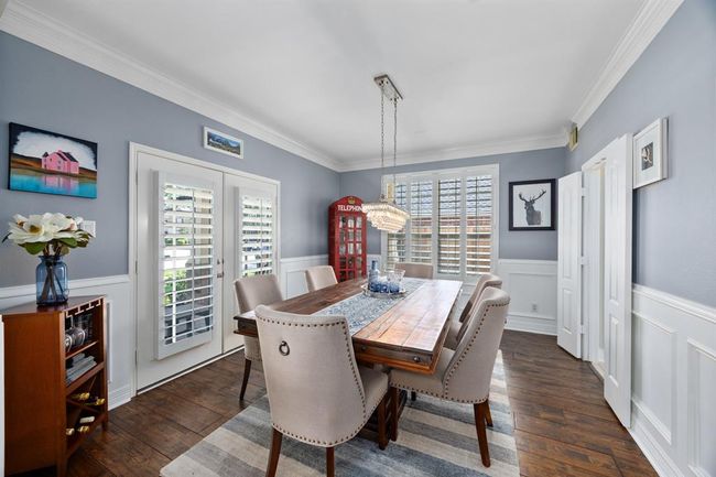 Plantation shutters span across the home to allow gorgeous, natural light. | Image 23