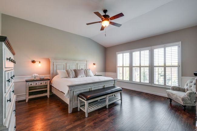 Generously sized primary suite with great windows overlooking the backyard and the hills! | Image 25