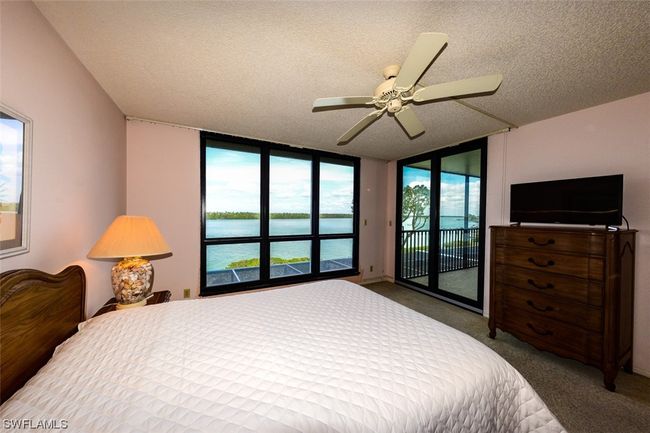 OWNER'S SUITE. ENTRANCE TO LIVING AREA IS TO RIGHT. | Image 25
