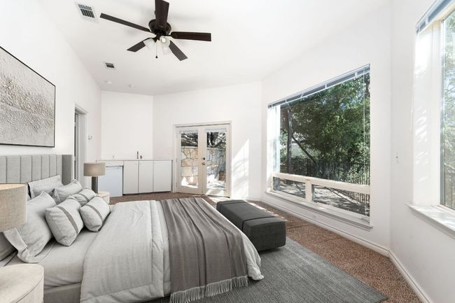 Secondary bedroom on the first level of the tower. Can be used as a bedroom or it can make a great office. | Image 18