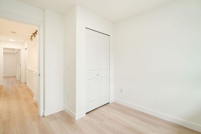 Unfurnished bedroom featuring baseboards, a closet, and light wood-type flooring | Image 31
