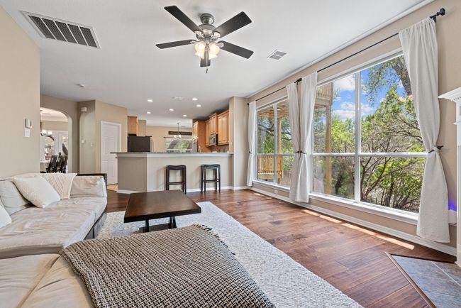 Open to both the kitchen and breakfast area, this central space feels connected yet comfortable—perfect for everyday living or easy entertaining | Image 12