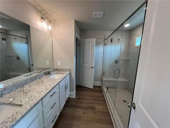 11 Creekside Commons Dr, Townhouse with 3 bedrooms, 3 bathrooms and null parking in Hoschton GA | Image 32