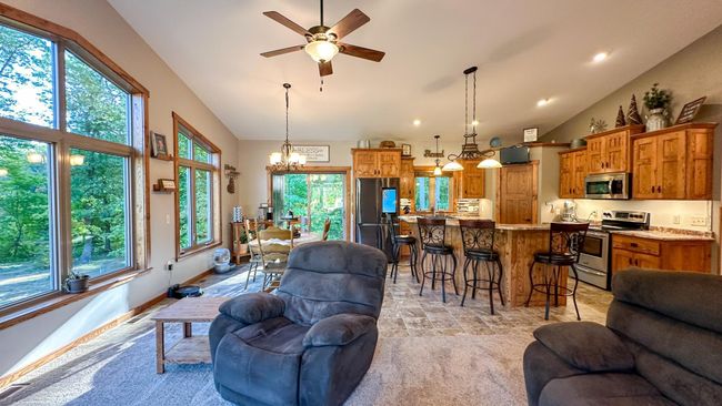 Dining open to kitchen | Image 7