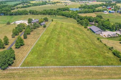 Drone / aerial view with a water view and a rural view | Image 1