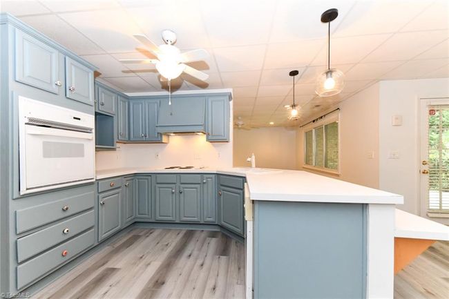 Complete full sized kitchen with breakfast bar | Image 32