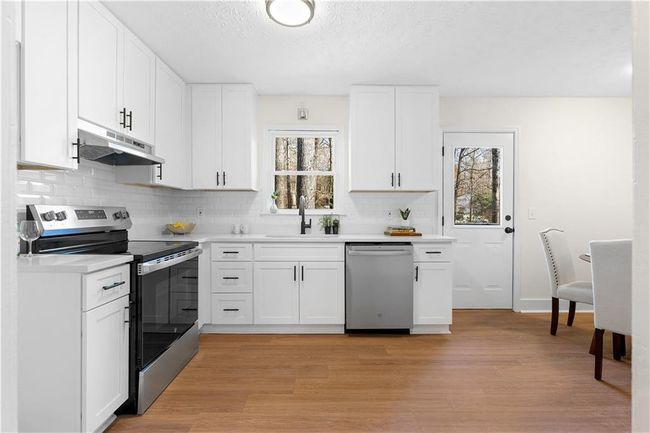 7000 Woodland Pl Nw, House other with 3 bedrooms, 2 bathrooms and null parking in Kennesaw GA | Image 6
