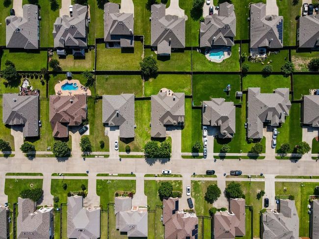 Aerial perspective of suburban area featuring a pool | Image 33