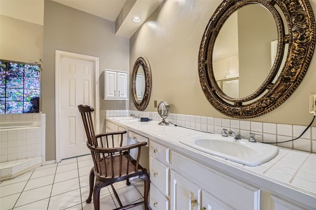 . . . with double sinks, sit down vanity, separate toilet room, . . . | Image 22