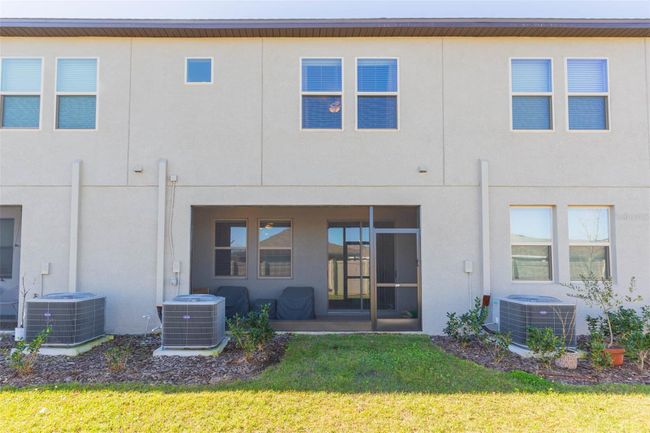 31915 Blue Passing Loop, Townhouse with 3 bedrooms, 2 bathrooms and null parking in Wesley Chapel FL | Image 42