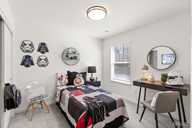 Carpeted bedroom with baseboards and a closet | Image 23