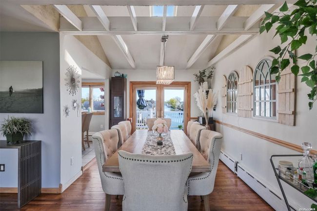 Exquisite Dining Beneath a Skylight w/Slider to Trex Deck & Waterfront Views | Image 7