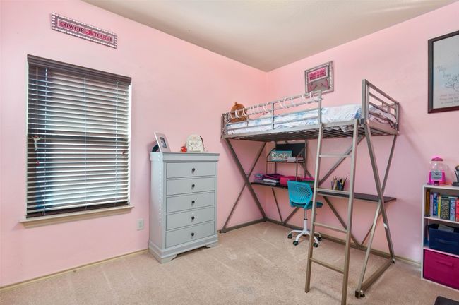 Bedroom with carpet floors and baseboards | Image 21