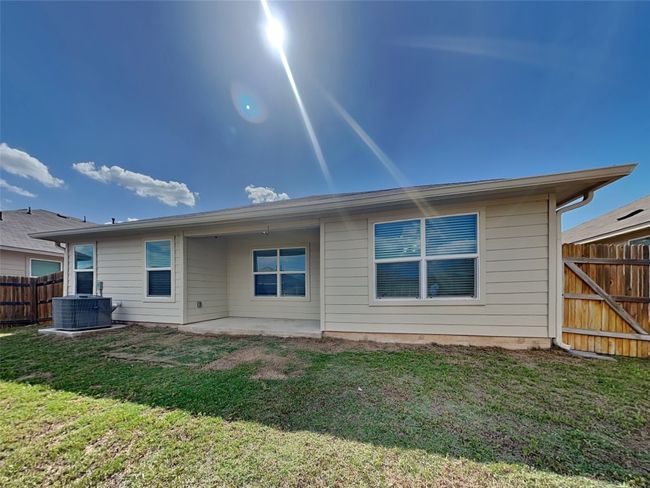Back of house with a patio | Image 15