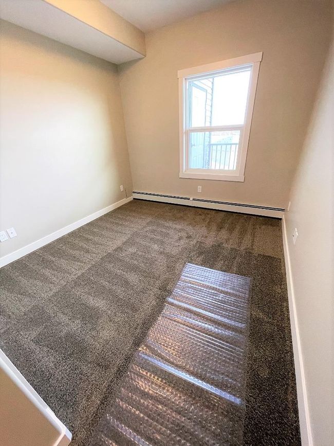 406 - 499 Meadow Lake Crt E, Condo with 2 bedrooms, 2 bathrooms and 1 parking in Brooks AB | Image 13
