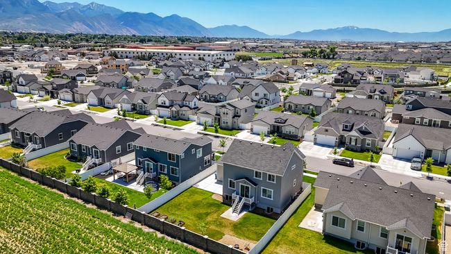 Aerial perspective of suburban area featuring a mountainous background | Image 42