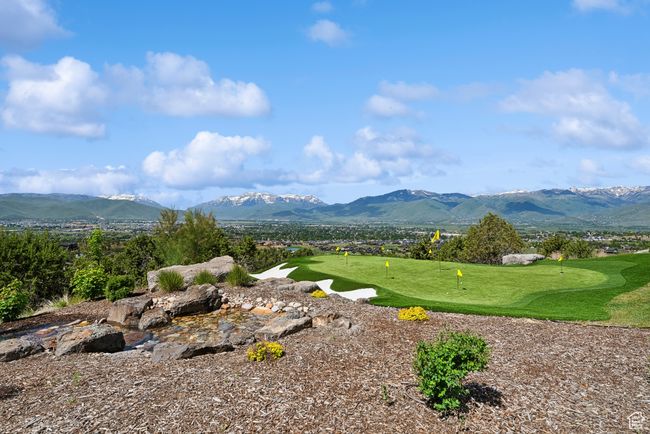 View of mountain background with a golf course | Image 69
