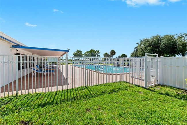 6905 Nw 73 Rd St, House other with 2 bedrooms, 2 bathrooms and null parking in Tamarac FL | Image 24