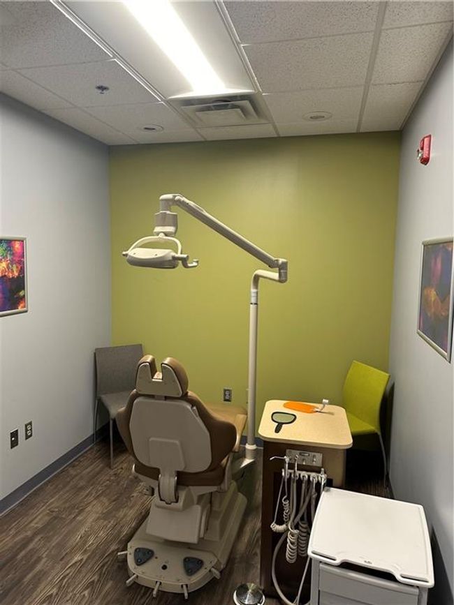 Misc room with dark hardwood / wood-style flooring and a drop ceiling | Image 24