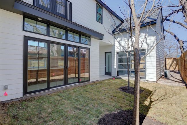 The middle yard / courtyard would be the perfect place to add a deck and/or pool, conveniently located off of the kitchen, covered patio and flex space / garage. SEE VIRTUAL TOUR LINK WITH INTERACTIVE FLOOR PLAN AND 3D WALK THRU. | Image 36