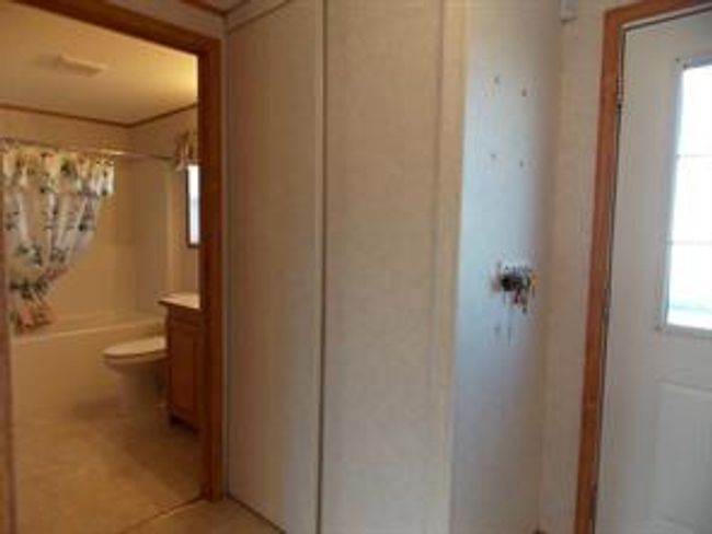77 - 5210 65 Ave, Home with 3 bedrooms, 2 bathrooms and 3 parking in Olds AB | Image 28