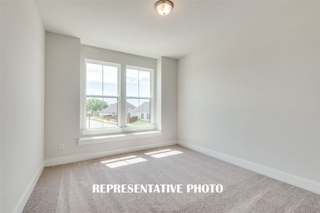 You'll find nicely sized secondary bedrooms in our Addison II floor plan. REPRESENTATIVE PHOTO. | Image 15