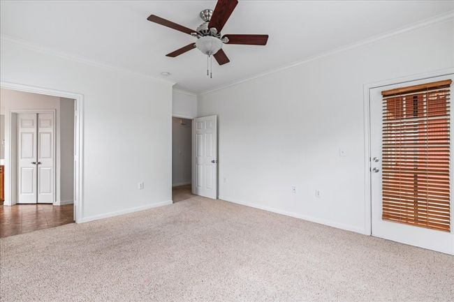 Enjoy patio access directly from the primary bedroom. | Image 18