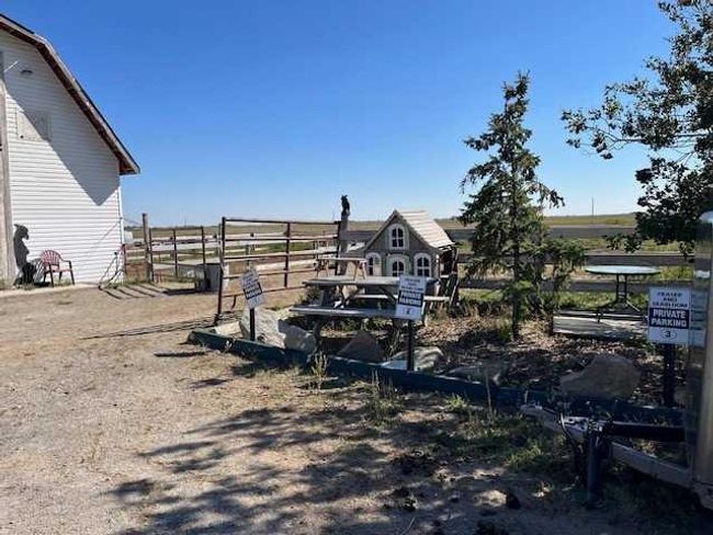 241036 Range Road 272, Home with 4 bedrooms, 3 bathrooms and 10 parking in Rural Rocky View County AB | Image 11