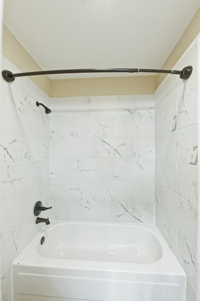 Full bathroom featuring shower / washtub combination | Image 17