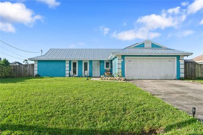 1006 Sw Sultan Drive, House other with 4 bedrooms, 3 bathrooms and null parking in Port Saint Lucie FL | Image 1