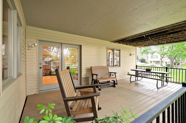 Peaceful and cozy lower level deck. | Image 47