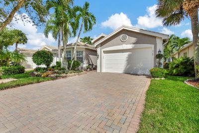 7766 Ocean Sunset Drive, House other with 3 bedrooms, 2 bathrooms and null parking in Lake Worth FL | Image 1