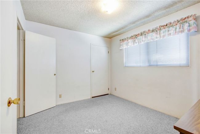 2nd bedroom with garage access. | Image 16