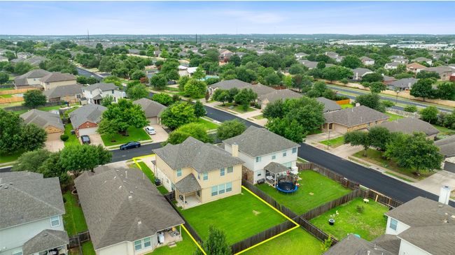 Aerial perspective of suburban area with property boundaries highlighted | Image 4