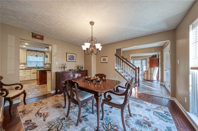 Formal dining room. Bamboo hardwood floors in DR, LR and FR. Light, bright, airy. | Image 3