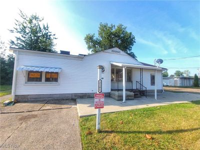 View of front of house featuring a front lawn | Image 3