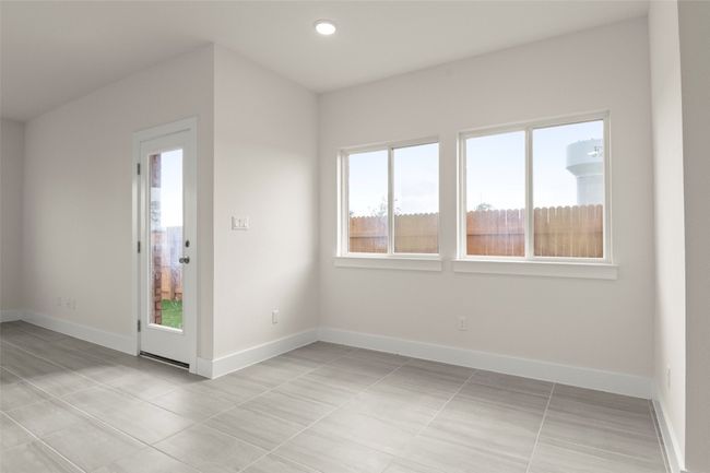 Empty room featuring recessed lighting, baseboards, and light tile patterned floors | Image 10