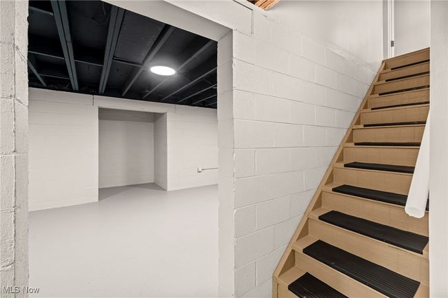 Stairs with concrete flooring and concrete block wall | Image 34