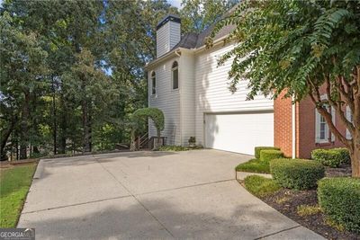 View of side of property featuring a garage | Image 3