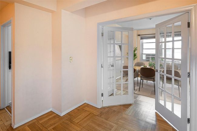 Virtually staged as dining room. Could also provide an office or guest room | Image 8